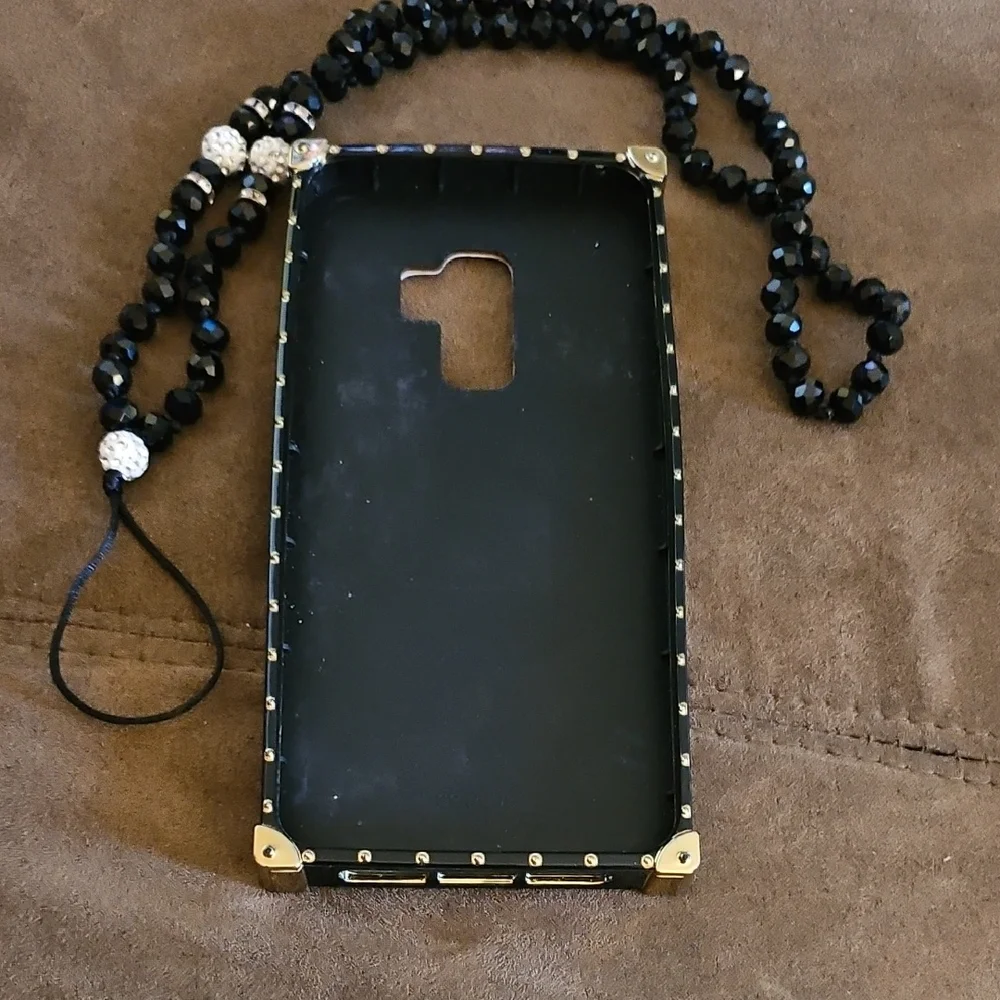 Samsung White and Black Case with Gold Accents